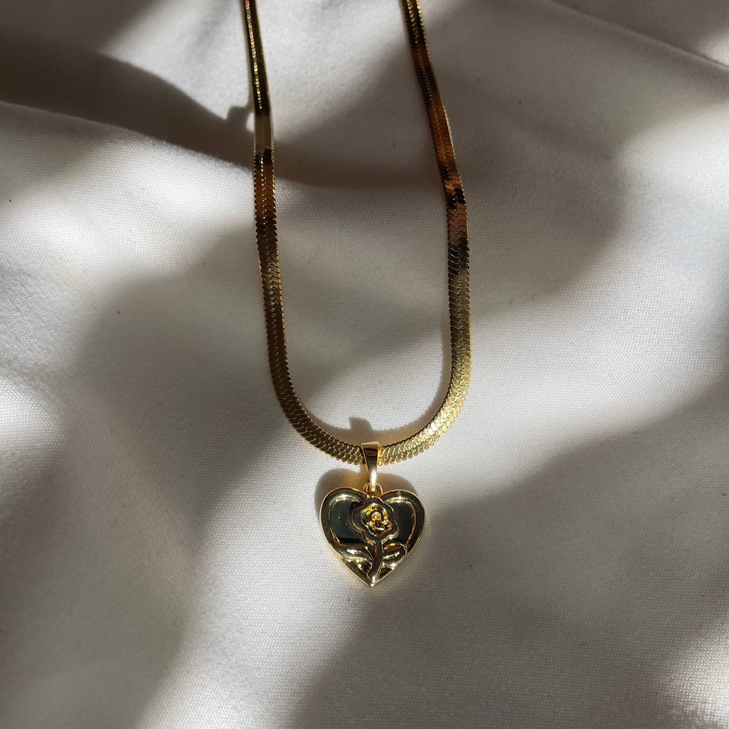 Your Song 24k Herringbone necklace. Gold Heart Rose charm