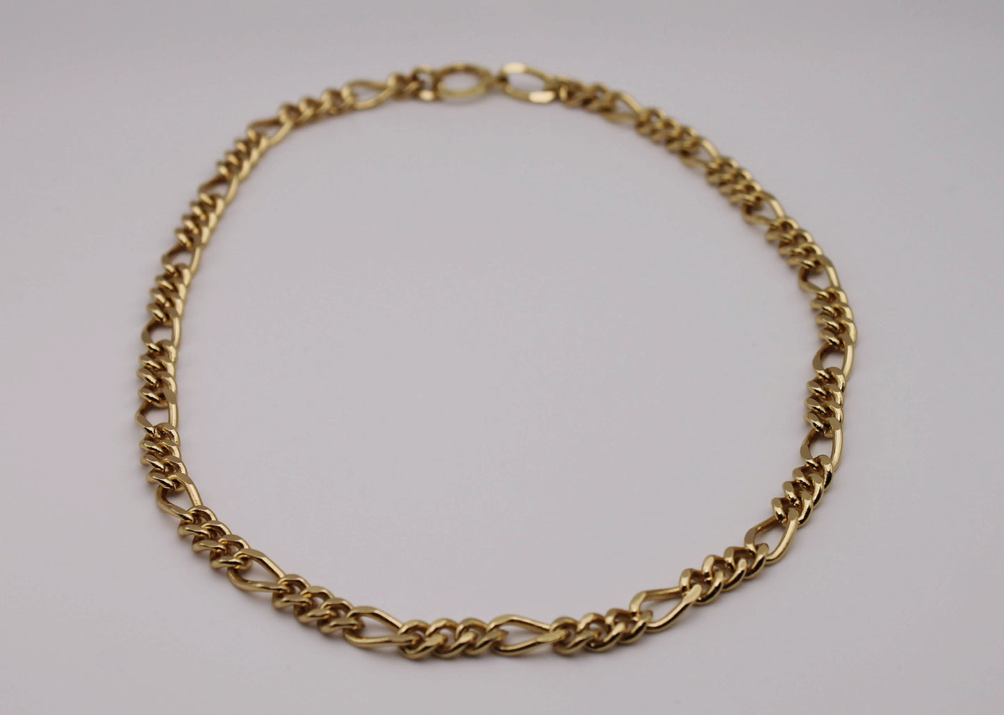 Send Me An Angel. Gold Figaro Necklace