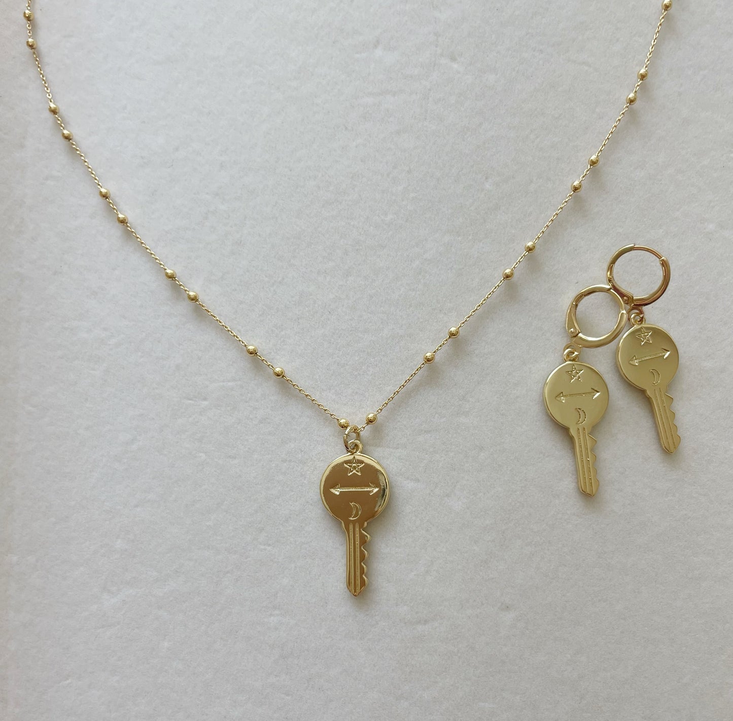 Free Your Mind Gold Filled Key Charm Huggies. Gold Filled Earrings
